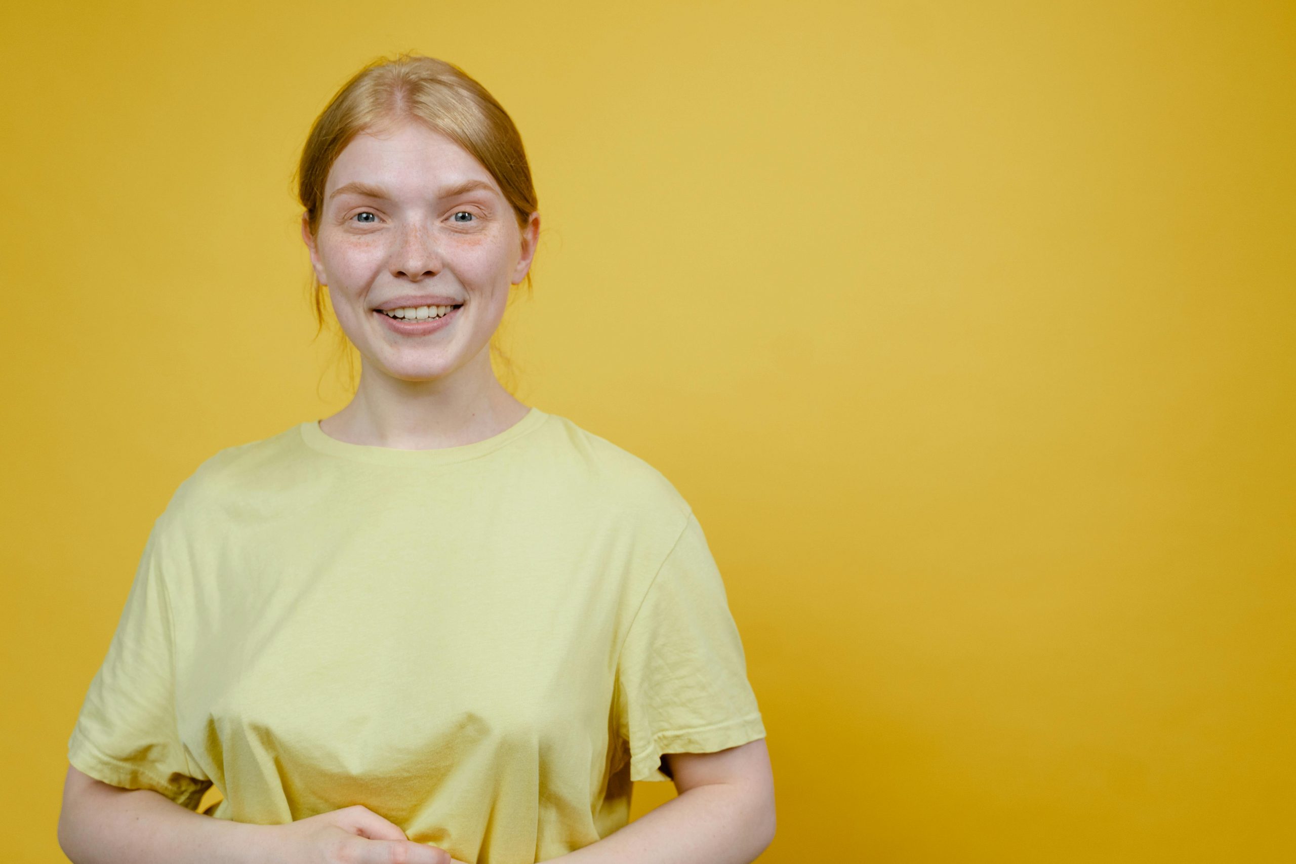 woman in yellow tshirt